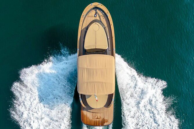 All-Inclusive Capri Boat Tour with City Visit from Positano - Swims, music breaks, and the Punta Ventroso aperitif moment