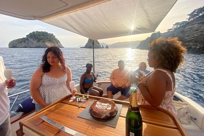 Capri and Blue Grotto Small Group Boat Tour - Punta Ventroso: the onboard break where snorkeling actually happens