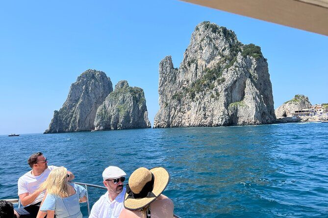 Capri Boat Tour and Blue Grotto Visit - Marina Grande and the Baths of Tiberius: classic Capri, quick hits