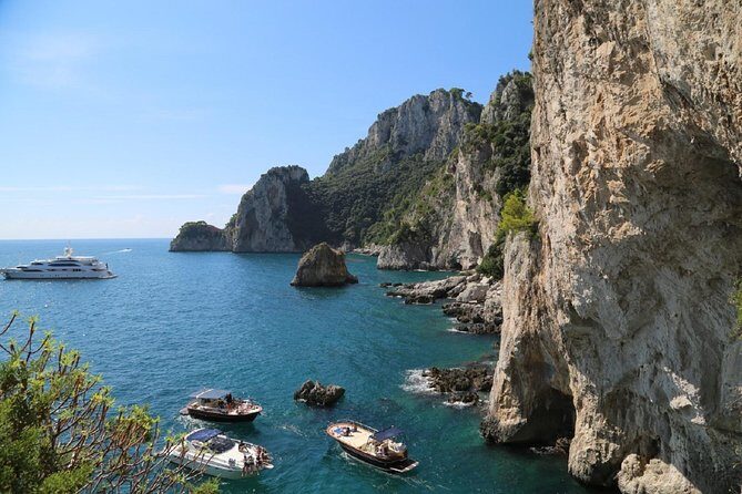 Capri Boat tour from Positano with Light Lunch, Drinks & Swim - White Grotta and Grotta Verde: timed stops, photo time, and sea-light drama