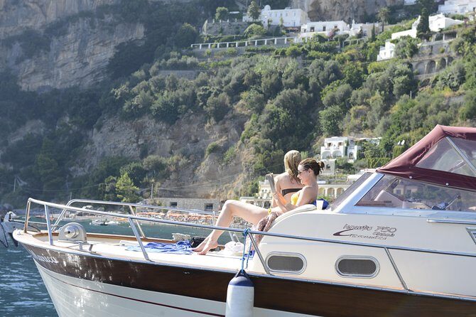 Capri Boat tour from Positano with Light Lunch, Drinks & Swim - A boat route built for views: Marina Grande to cliff towns and sea stacks