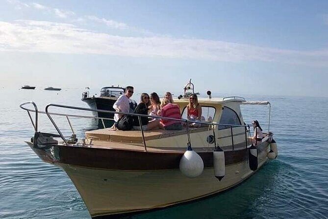Capri Collective Boat Excursion from Positano - Swim Breaks and Onboard Comfort: Towels and Soft Drinks