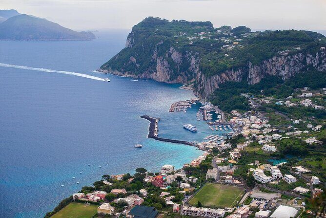 Capri Premium Private Boat Tour + City Visit - The morning coast of Capri: Spiaggia Grande and Bagni di Tiberio