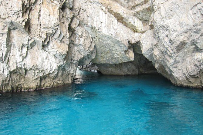 Capri Private Boat Tour from Positano, Praiano or Amalfi - Cruising past I Faraglioni and into Capri’s famous Blue Grotto area