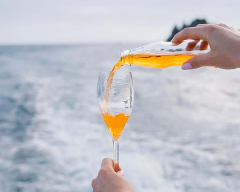 From Positano: Amalfi Coast Sunset Cruise - Group Tour - Marina di Praia: colorful boats and white houses along the shore