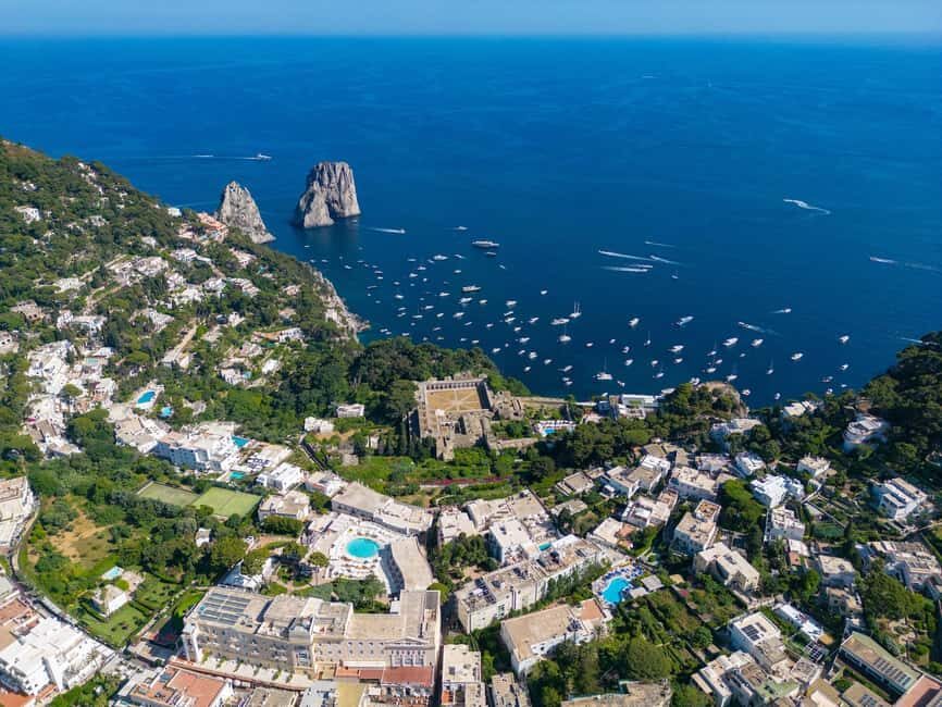 From Positano: Day trip to Capri - Group Tour by boat - White Grotto, Faraglioni, and the Capri Coastline Show