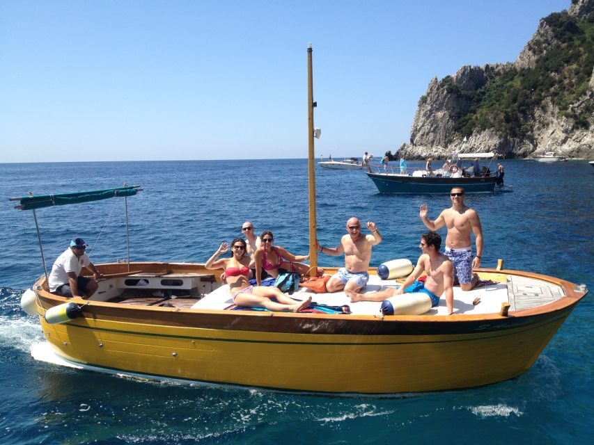From Positano: Private Boat Tour to Capri or Amalfi - Capri island time: Blue Grotto, Faraglioni views, and coves you reach by boat