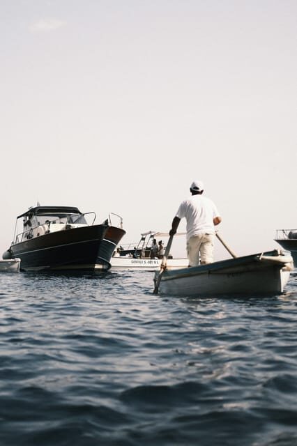 Positano: Capri and Blue Grotto Shared Boat Tour with Drinks - From Positano pickup to Marina della Lobra: how the day starts smoothly