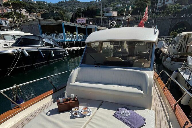 Private Amalfi Coast Boat Tour from Positano: Swim & Explore - Meet on Via Regina Giovanna and settle into a 7-hour plan