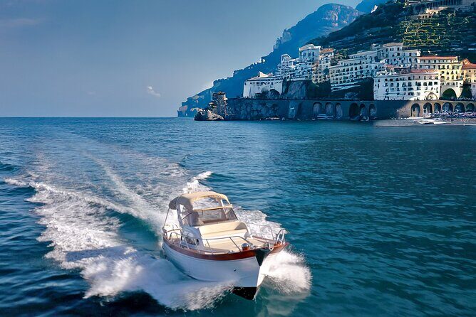 Private Amalfi Coast Sunset Boat Tour - Sorrento Coast stop: the first cove for swimming and aperitif