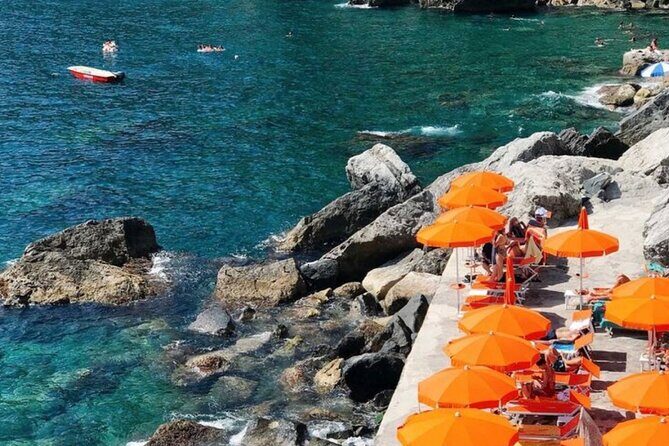 Private Boat Tour from Positano to the Amalfi Coast with Drinks - Lover’s Bridge and The Miracle filming set: photos plus a pause for the water