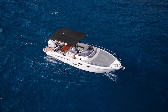 Private Boat Tour with Saver 7.50 WA - Punta Carena Lighthouse: Red-and-White Views With Built-In Drama