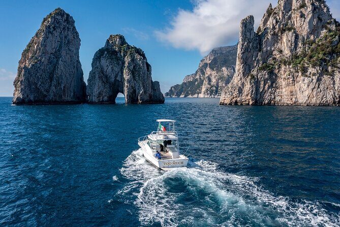 Private Day Boat Trip to Capri and Blue Grotto from Positano - Punta Carena Lighthouse: jagged coves and a slower coast look