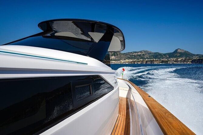 Private Full-day Luxury Boat Tour to Capri from Amalfi Coast - Marina Piccola swim stop: time to cool off, plus a yacht-bay vibe