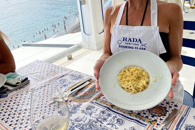 Rada Rooftop Cooking Class in Positano - The rooftop terrace meal: wine, limoncello, and sunset vibes