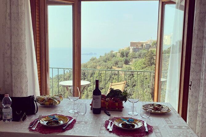 Small-Group Cooking Class in Positano: Gnocchi, Tiramisù & Drinks - Entering a Positano family kitchen at Barba Angela